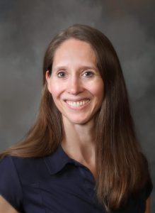 Dana Williams in dark blue / navy shirt - headshot
