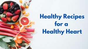 Picture with fresh strawberries, blackberries, raspberries, grapefruit and other healthy fruits and veggies with the words "Healthy Recipes for a Healthy Heart" written on it in blue font