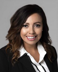 Nelly Cooper APRN Headshot photo with black suit jacket nerlyn cooper