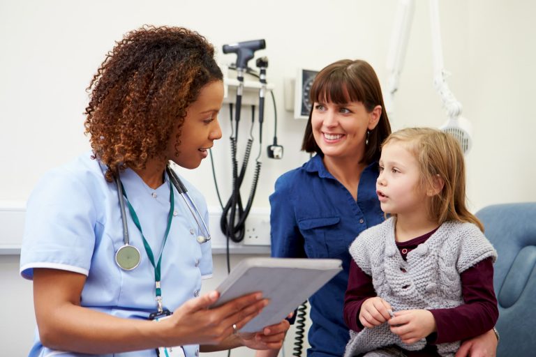 black doctor with white mom and white daughter young girl kid patient patient education in doctors office patient stories