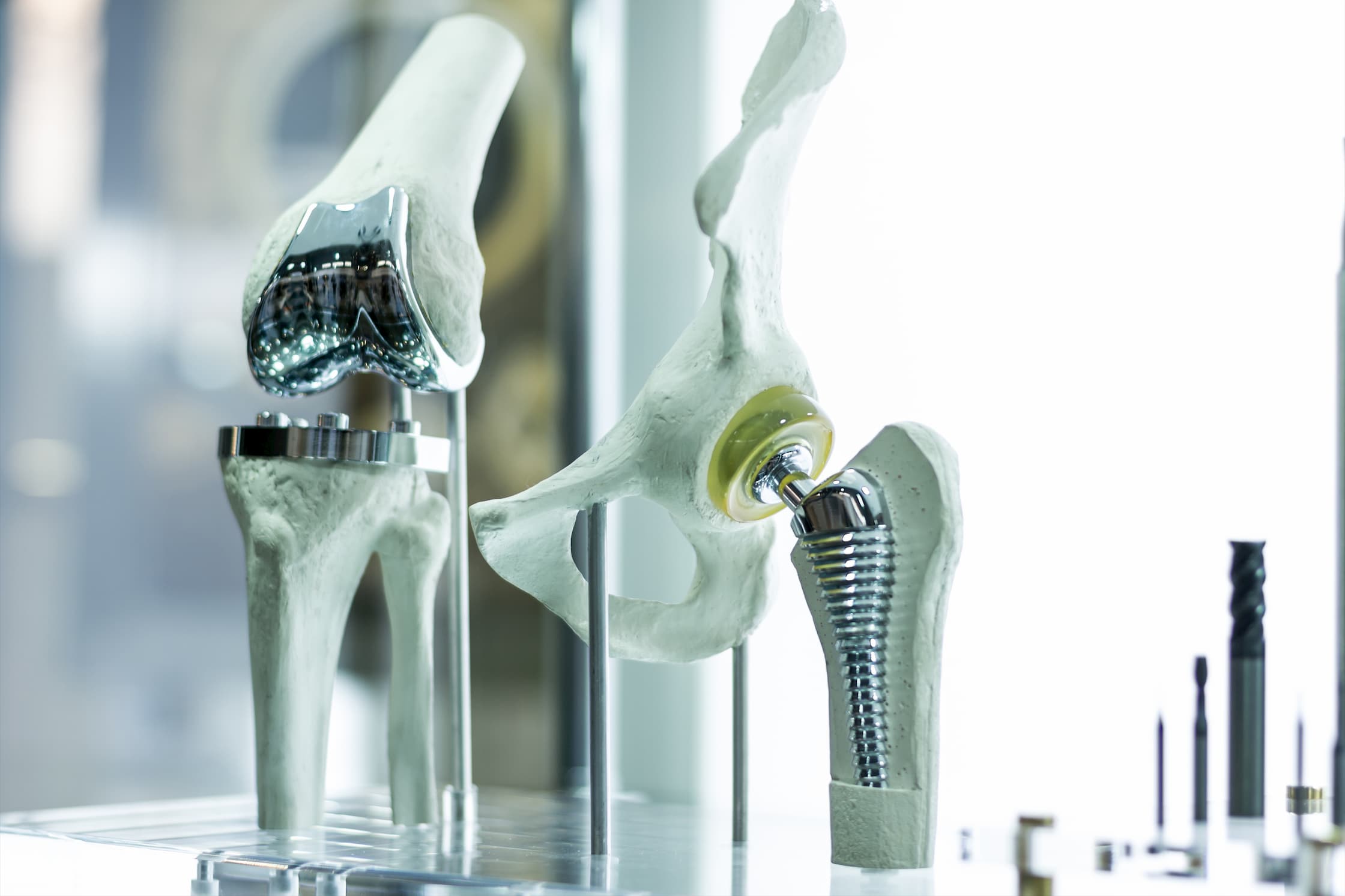 total knee replacement hip replacement models sitting on table