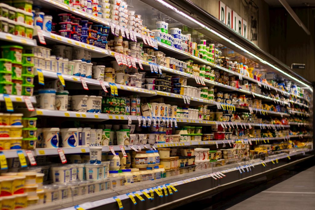 dairy aisle stock image of grocery store or supermarket