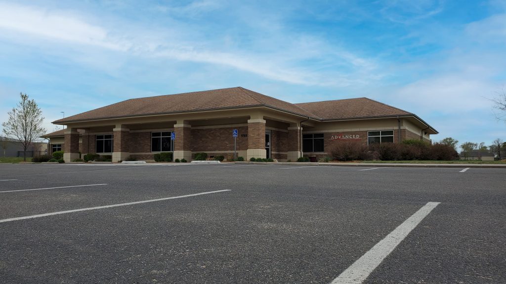 wide shot of nmc health immediate care park city family medicine park city kansas urgent care occupational medicine midwest occupational medicine building