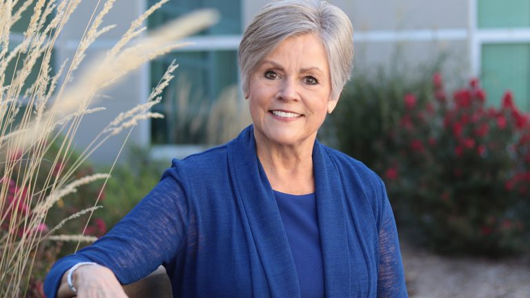 NMC Health CEO Val Gleason celebrating Top 100 Rural & Community Hospital recognition 2026