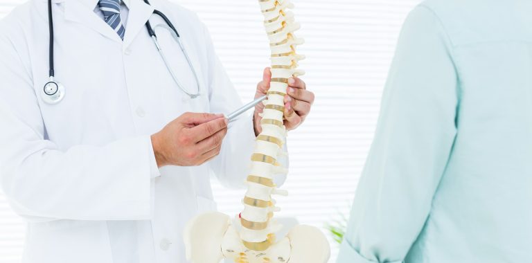 doctor teaching a spine class