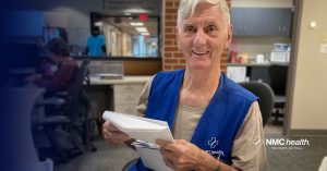 friendly older gentleman smiling in hospital