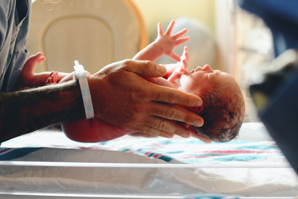 a person holding a baby