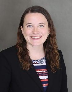 a woman smiling at camera