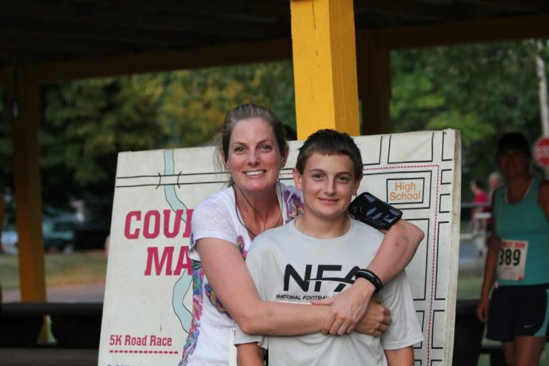 Woman and boy smiling together