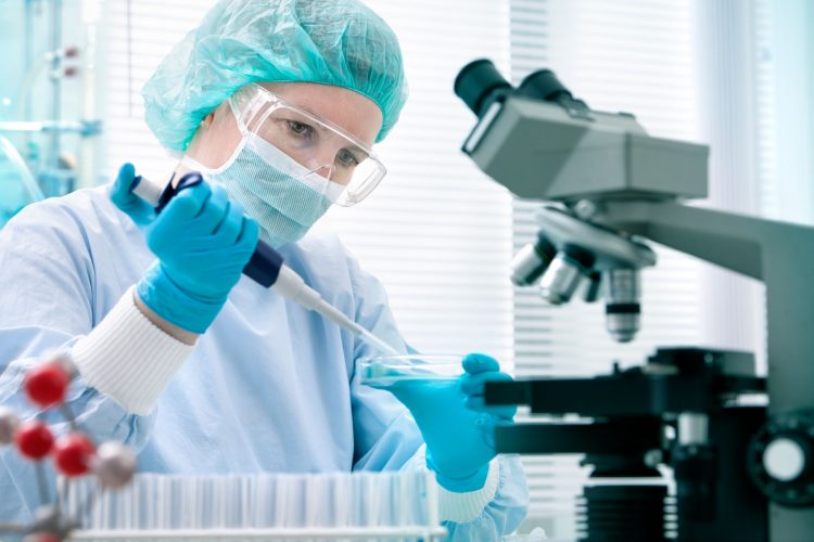 COVID-19 Vaccine Page Photos medical lab scientists testing chemicals covid vaccine trials covid-19 virus vaccination vaccine lab eua fda approved